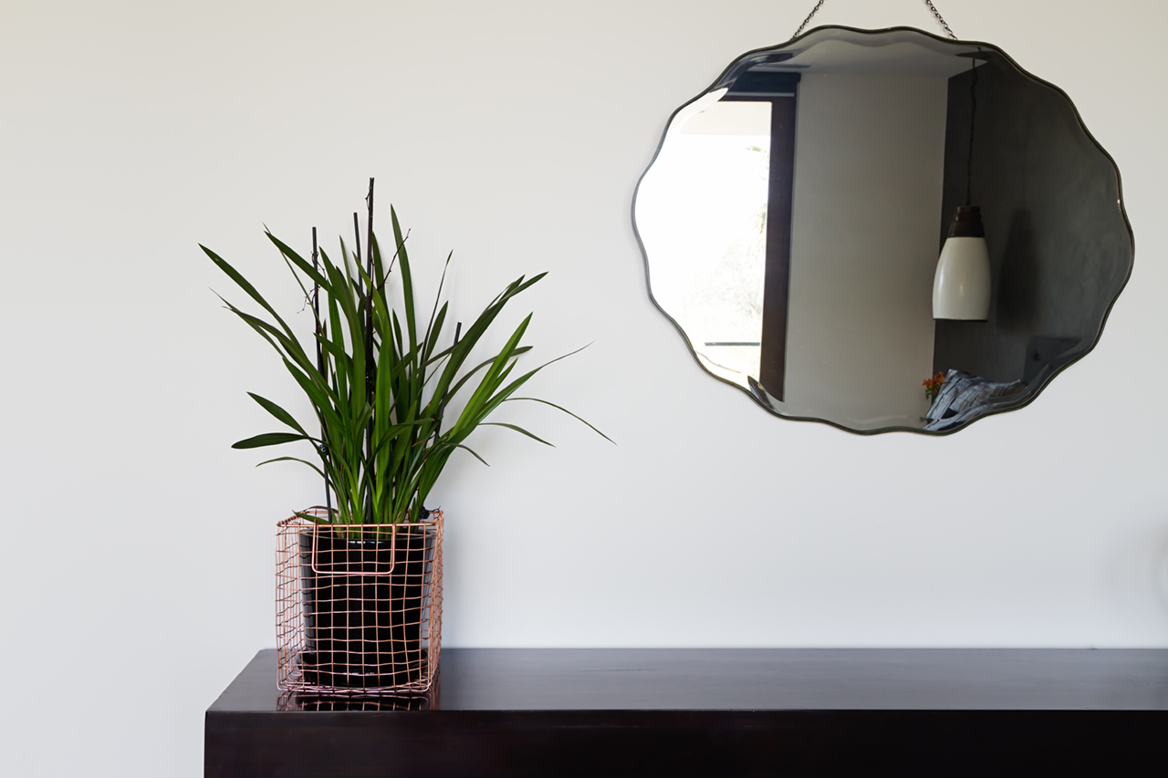 Home-interior-decor-details-copper-wire-basket-and-mirror-